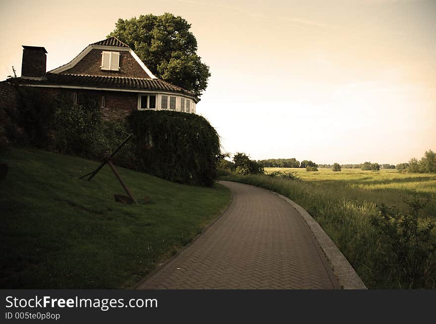 A small home in holand overlooking a field. A small home in holand overlooking a field.