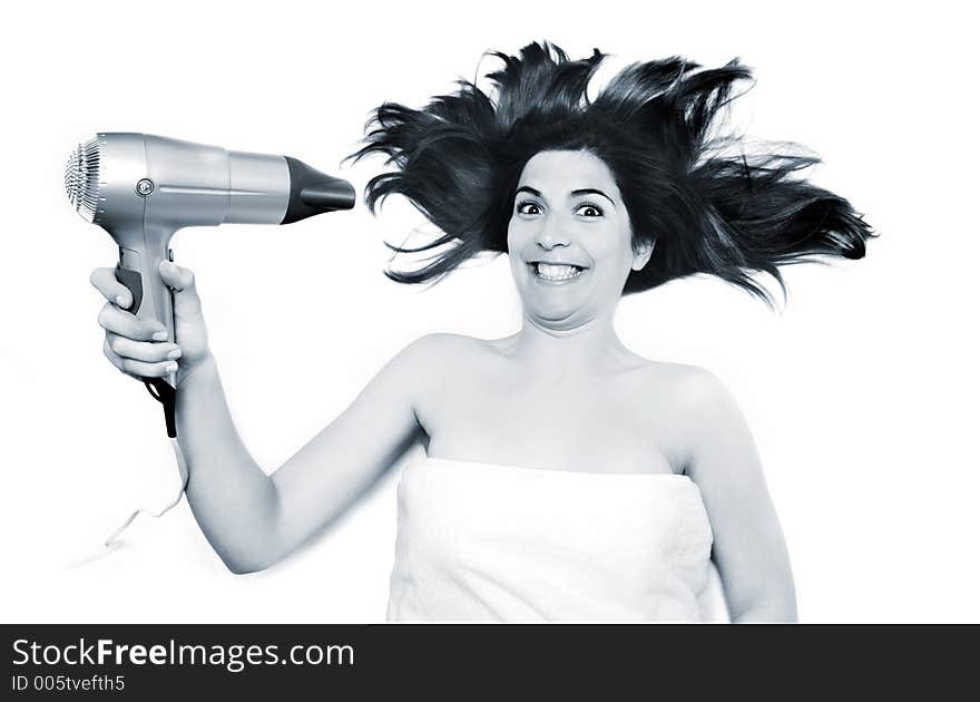 Young beautiful woman drying is hair. Young beautiful woman drying is hair