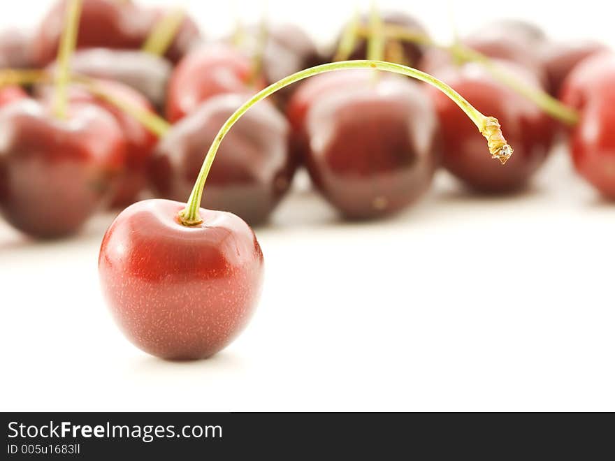 Cherries on white background