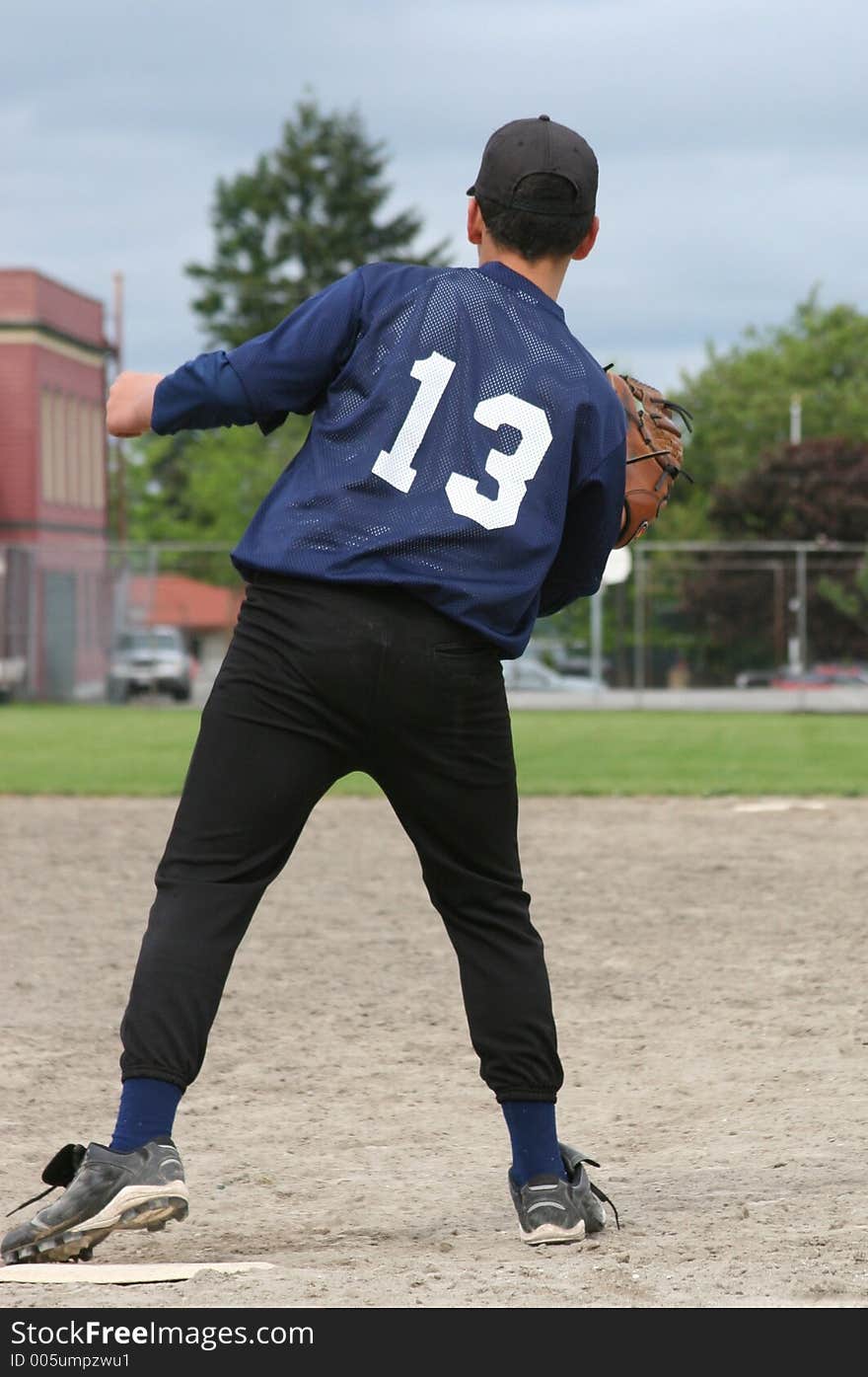 A first baseman makiing the play. A first baseman makiing the play.