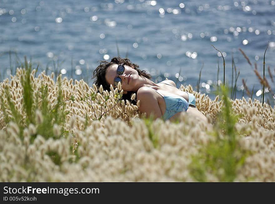 Girl lie in grass