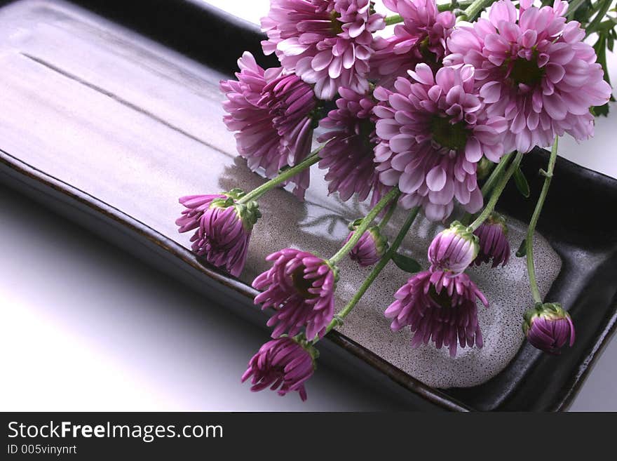 Japanese utensil decorated with chrysanthemums. Japanese utensil decorated with chrysanthemums