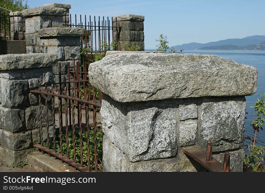 Winding Stone And Iron Fence