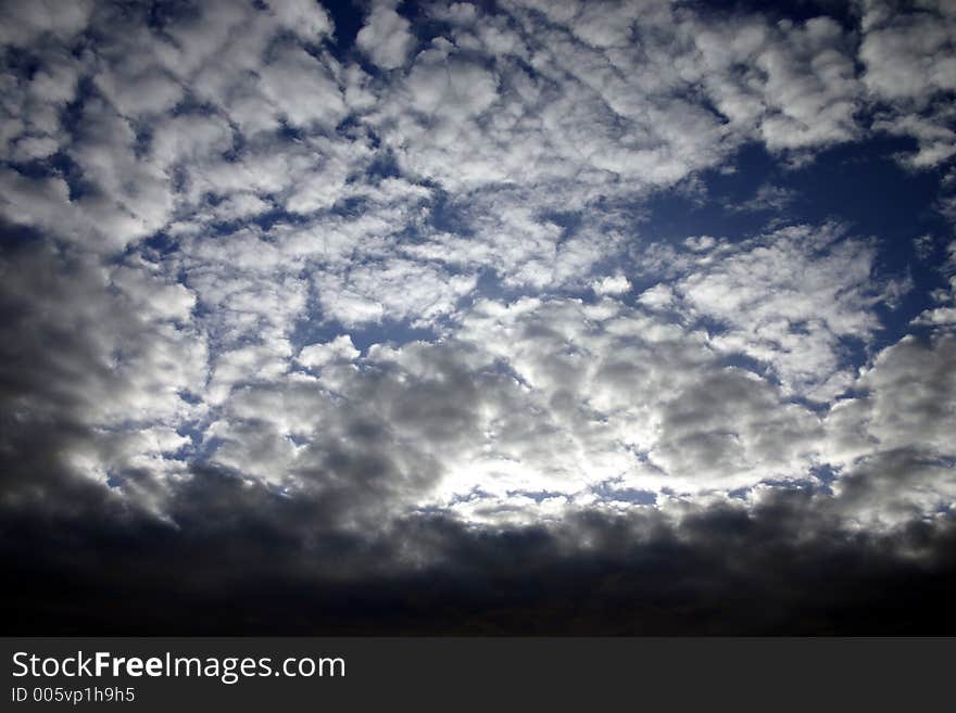 Sun shining through clouds