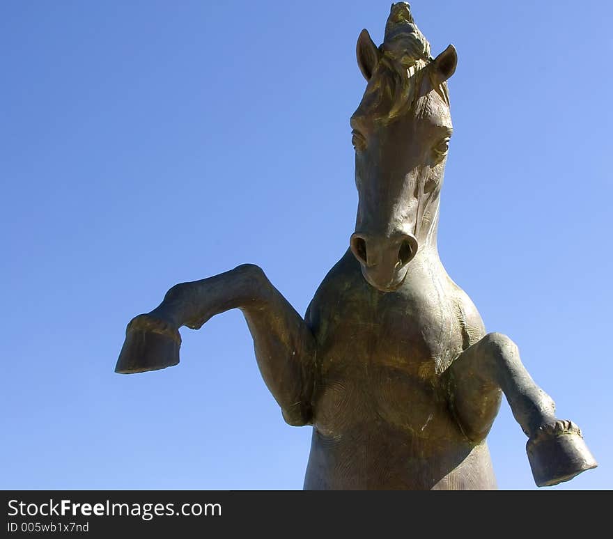 Statue of a horse standing on hind legs