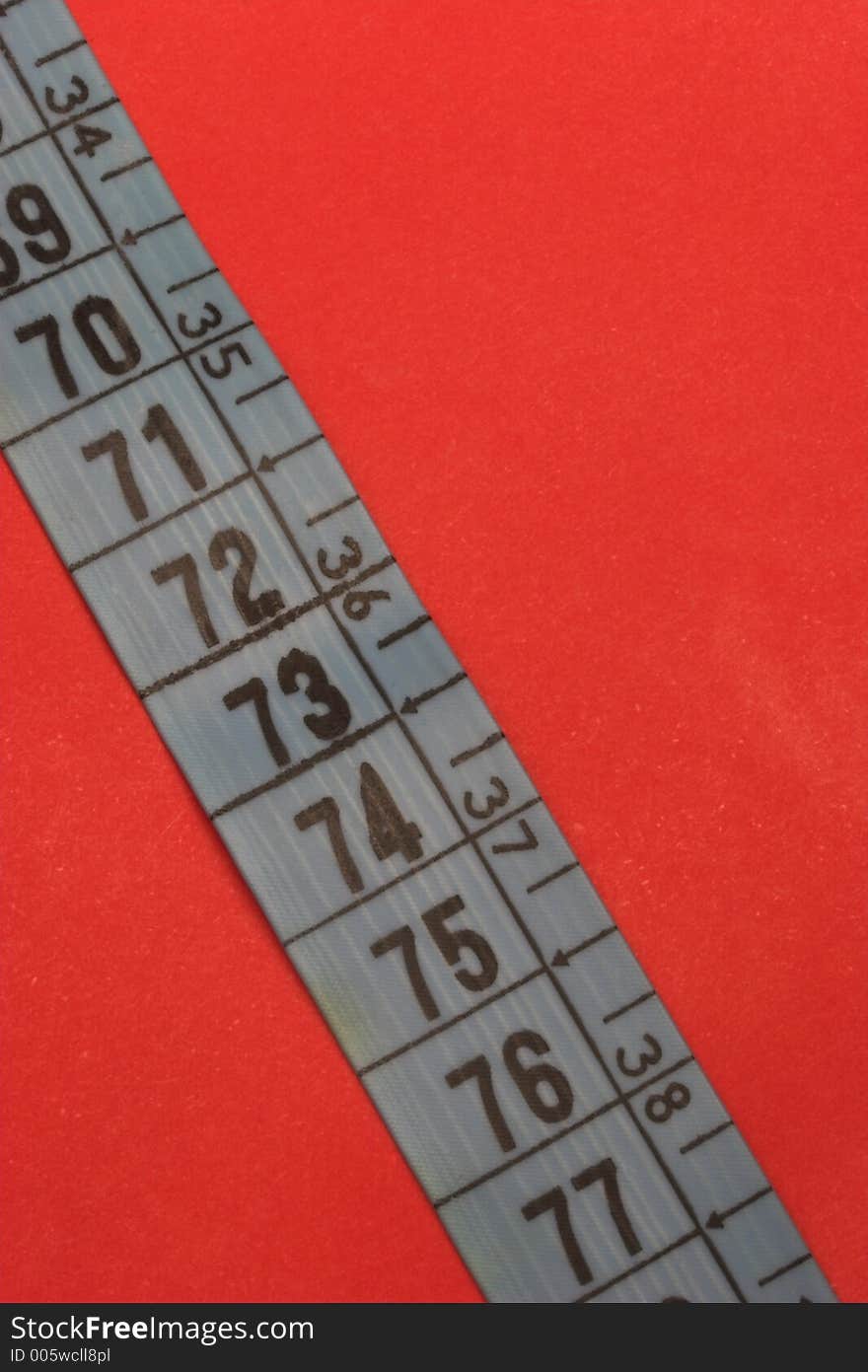 Measure tape with vivd red background