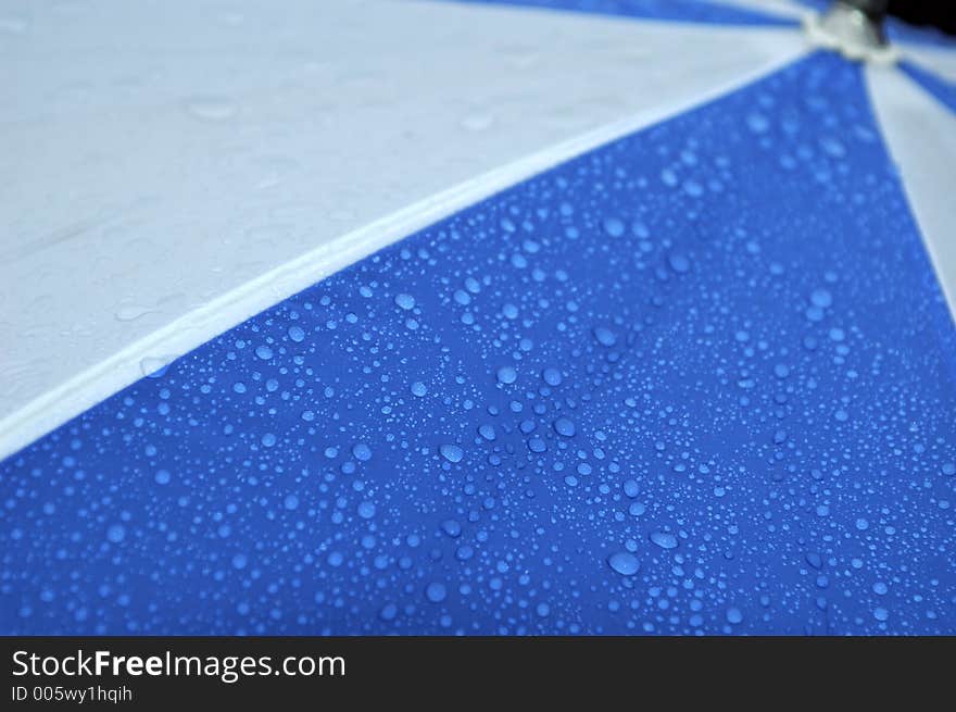 Water droplets and umbrella