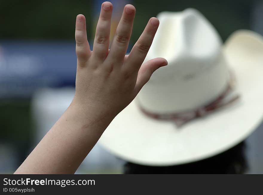 Child's hand in the air