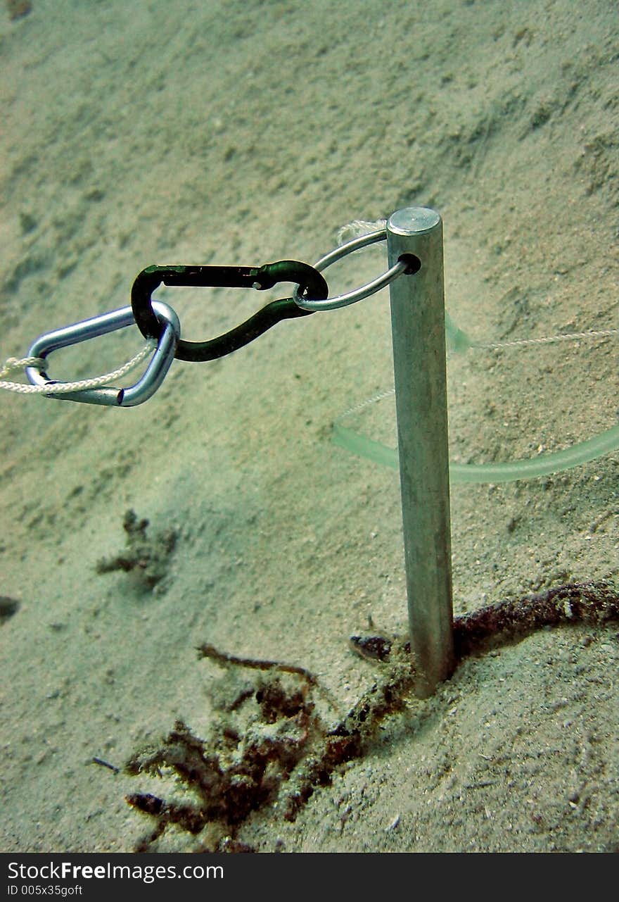 This metal stick is called a Charlie Stick or a pointer widely used by scuba divers while scuba diving. This metal stick is called a Charlie Stick or a pointer widely used by scuba divers while scuba diving.