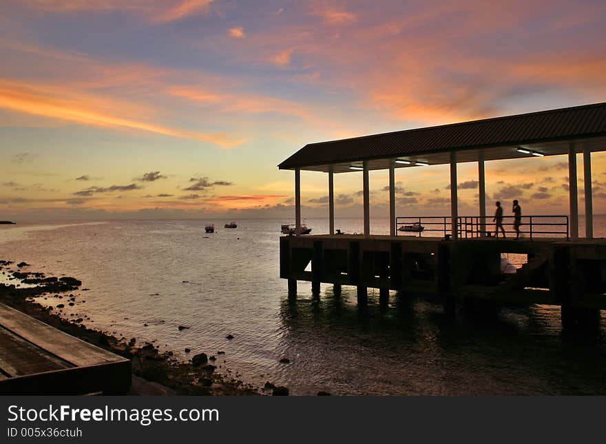 Silhouette of a pier during a sunset at Layang-Layang Island. Silhouette of a pier during a sunset at Layang-Layang Island