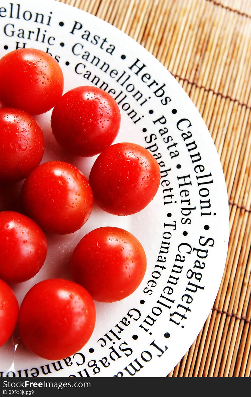 Tomatoes on a white plate