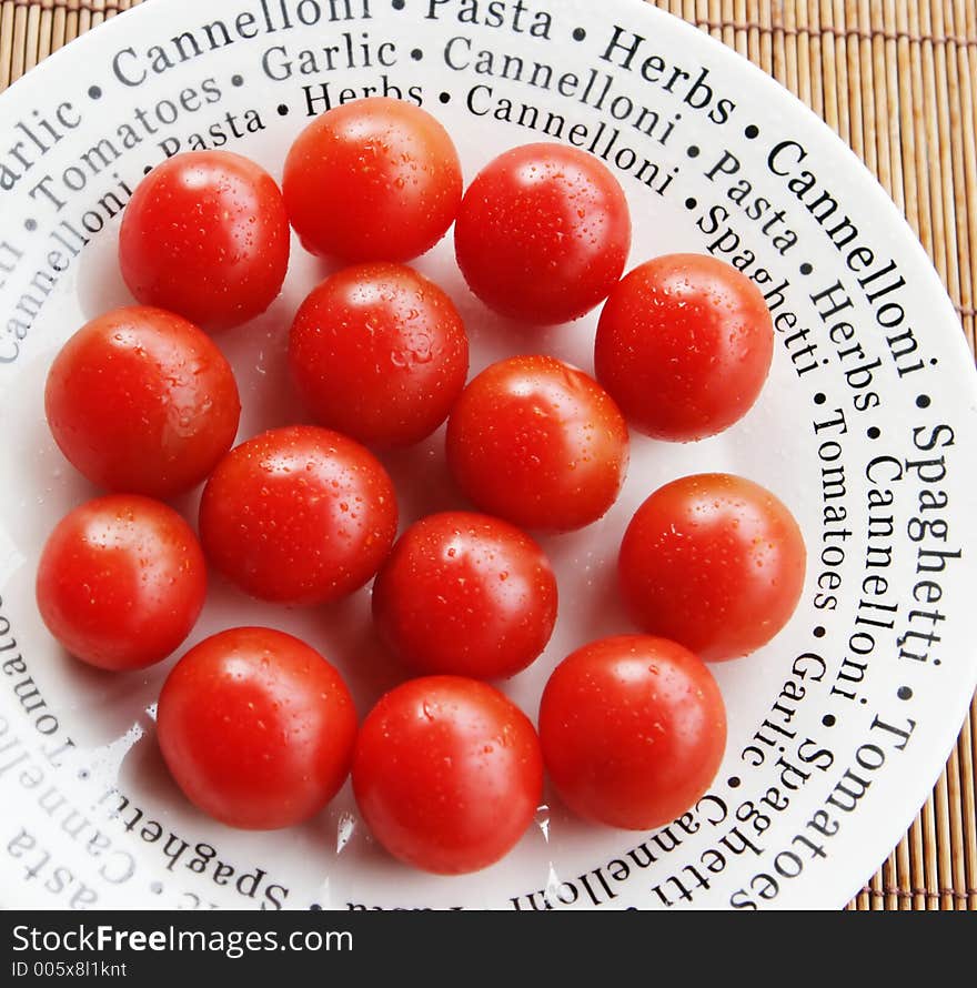 Tomatoes on a white plate