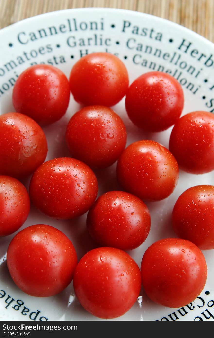 Tomatoes on a white plate