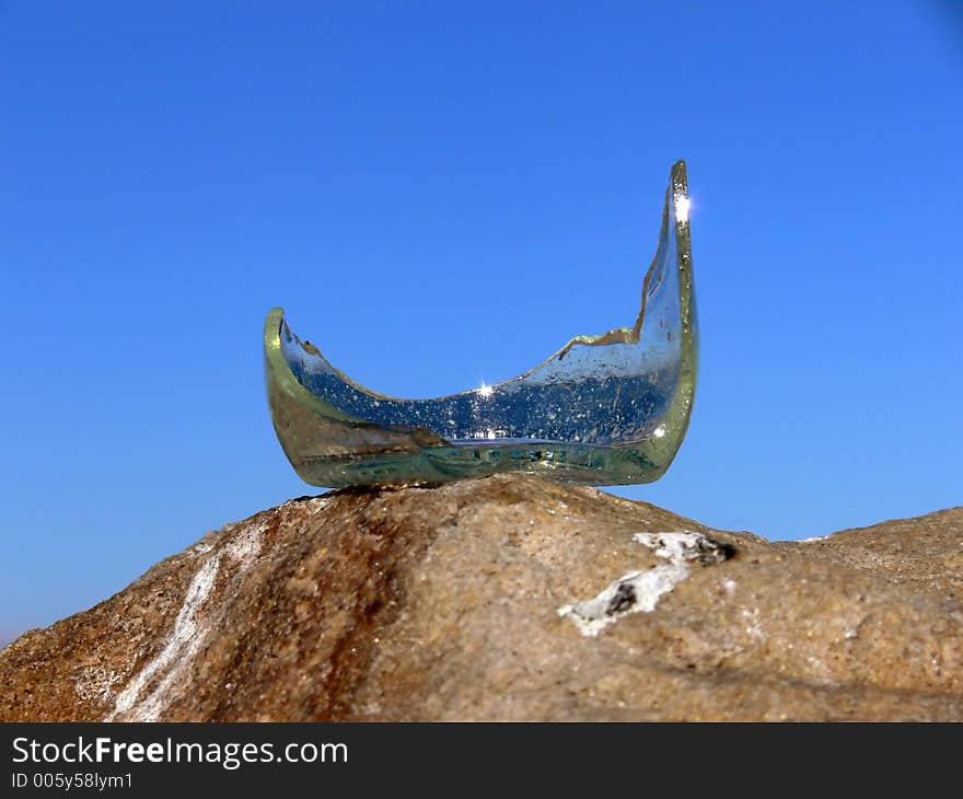 A broken bottle found on the beach. A broken bottle found on the beach