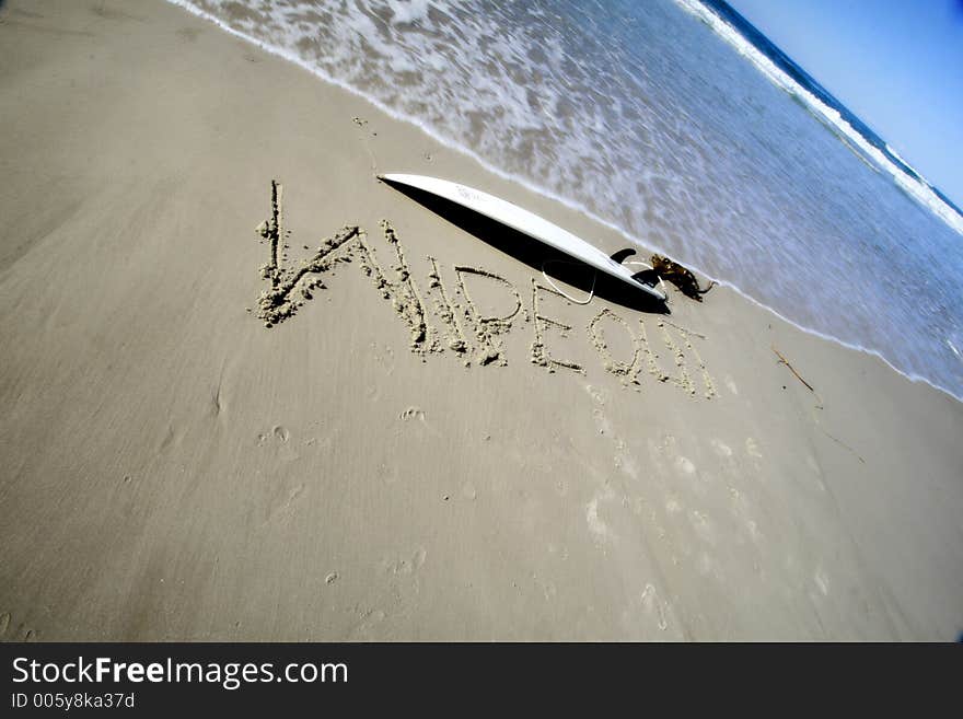 Surfboard washed up on the beach. Surfboard washed up on the beach