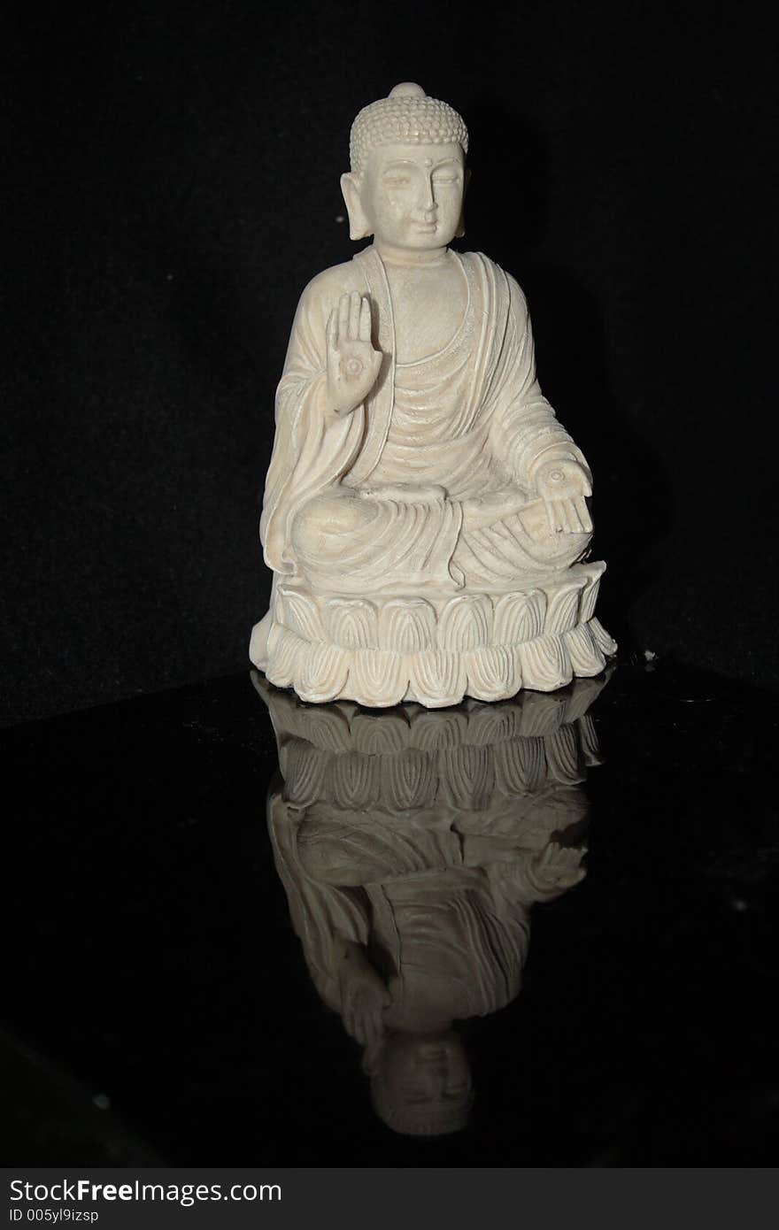 Buddha and reflection