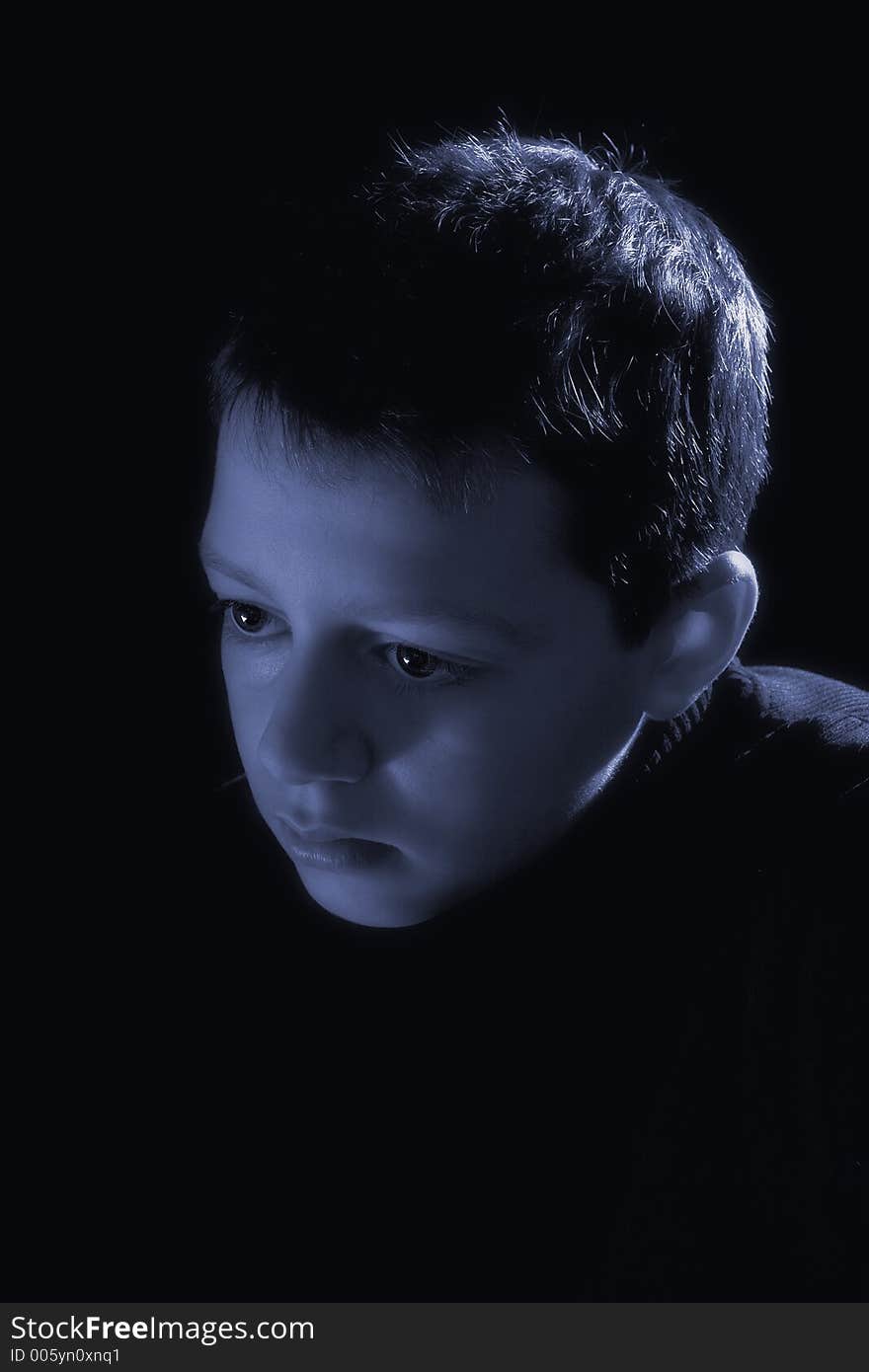 Monotone portrait photograph of teenage boy