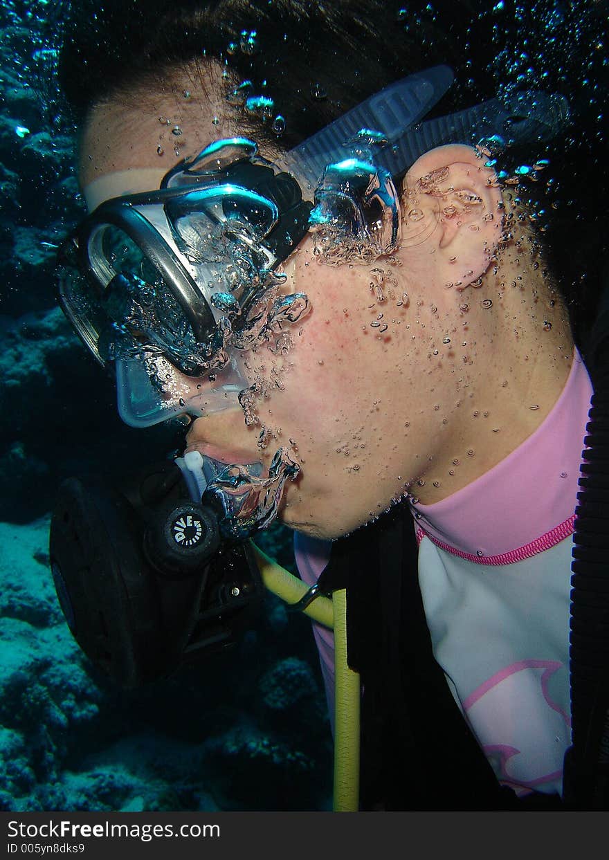 Female diver surronded by bubbles. Female diver surronded by bubbles