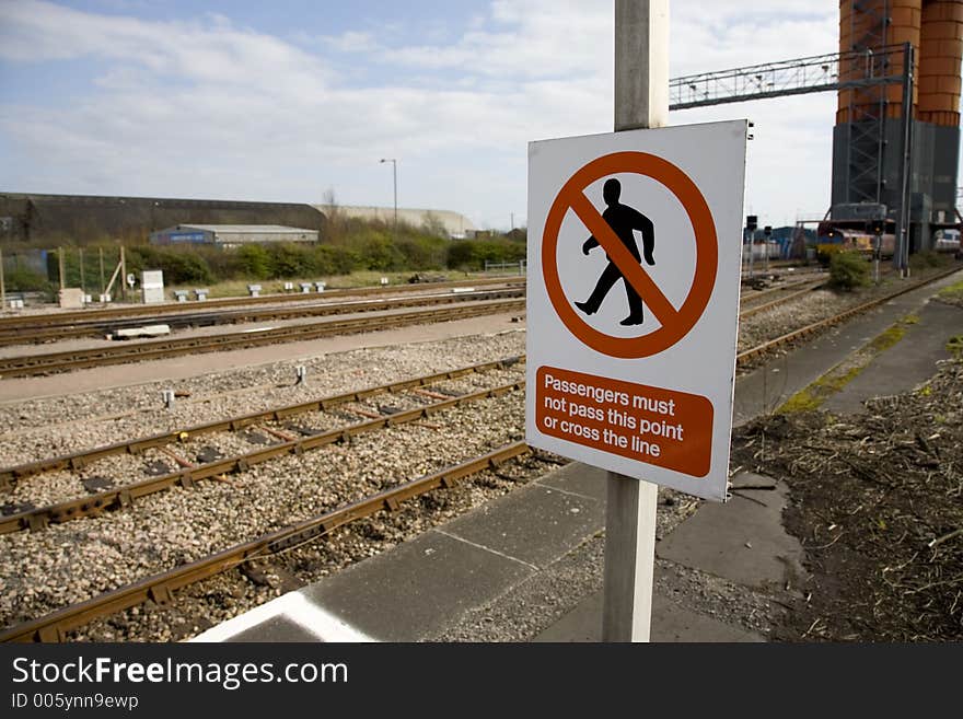 Do not pass this point  sign on railway platform