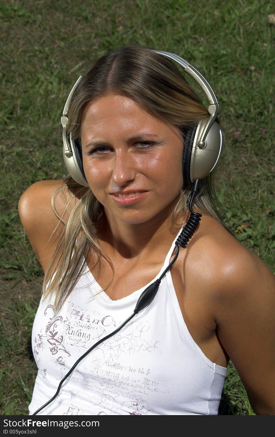 Woman Listening To Music Outdoor