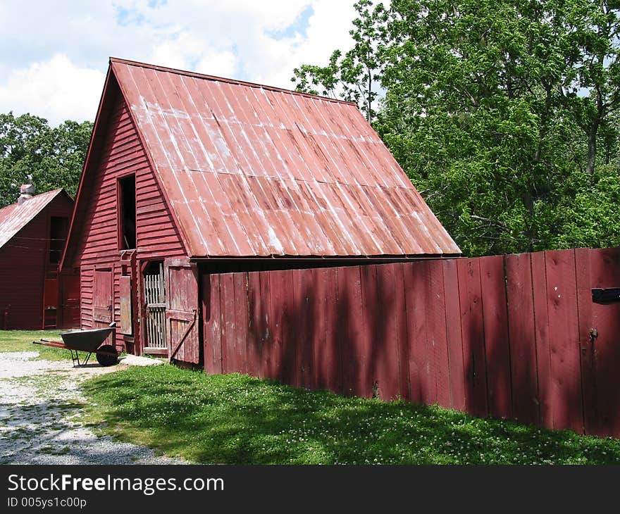 Red barn with fence on grounds of Carl Sandburg homestead in nc