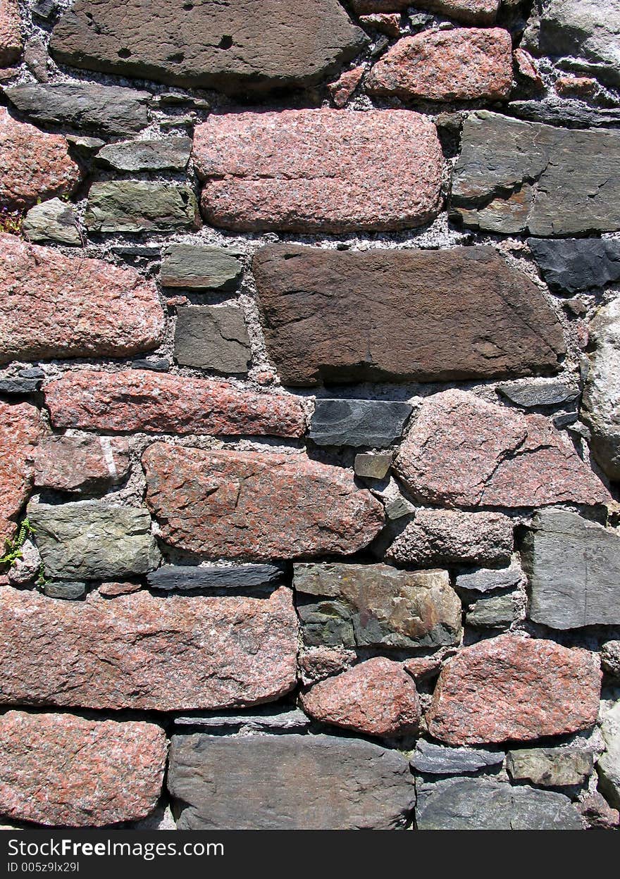 Lovely texture in this ancient red granite wall. Lovely texture in this ancient red granite wall