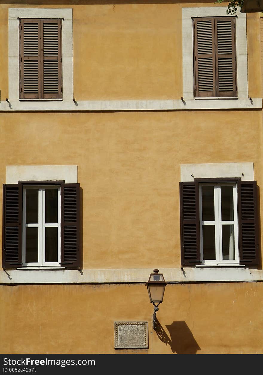 Windows of old building in Rome