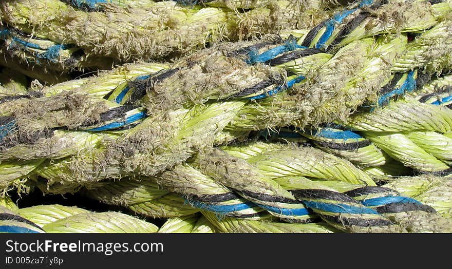 Closeup of an old, fraying ship's rope. Nice crisp colour and texture. Closeup of an old, fraying ship's rope. Nice crisp colour and texture.