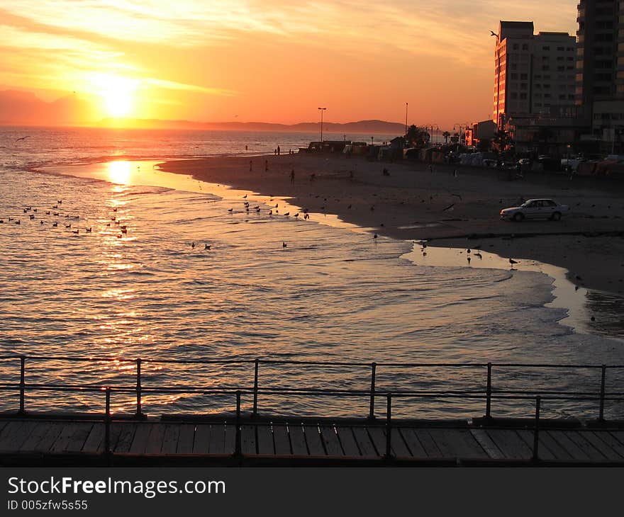 Sunset on Strand Beach. On False Bay, Western Cape SA. Sunset on Strand Beach. On False Bay, Western Cape SA