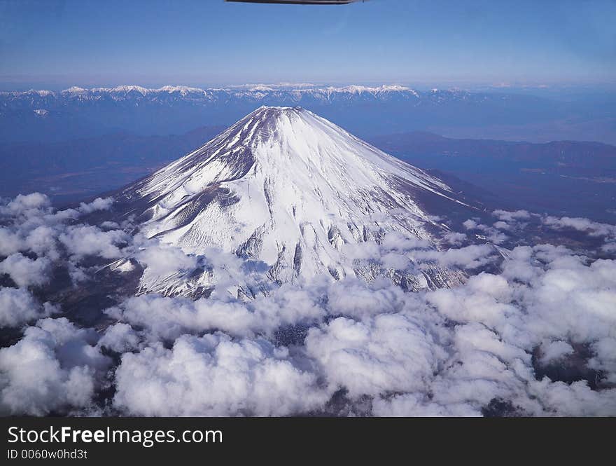 Mountain By Clouds