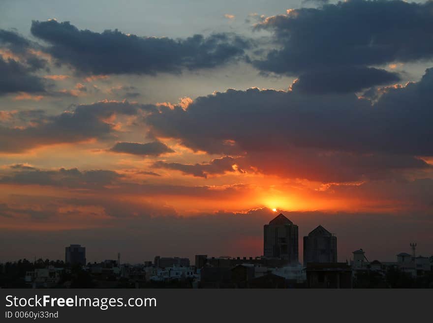 Silhouetted tower sunset in gurgaon india. Silhouetted tower sunset in gurgaon india