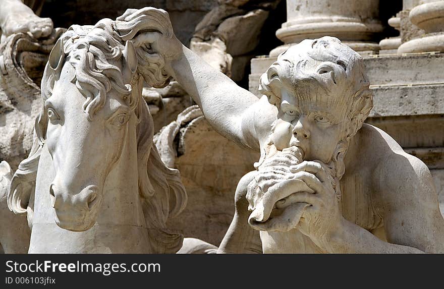 A Triton and Seahorse in the Trevi Fountain in Rome