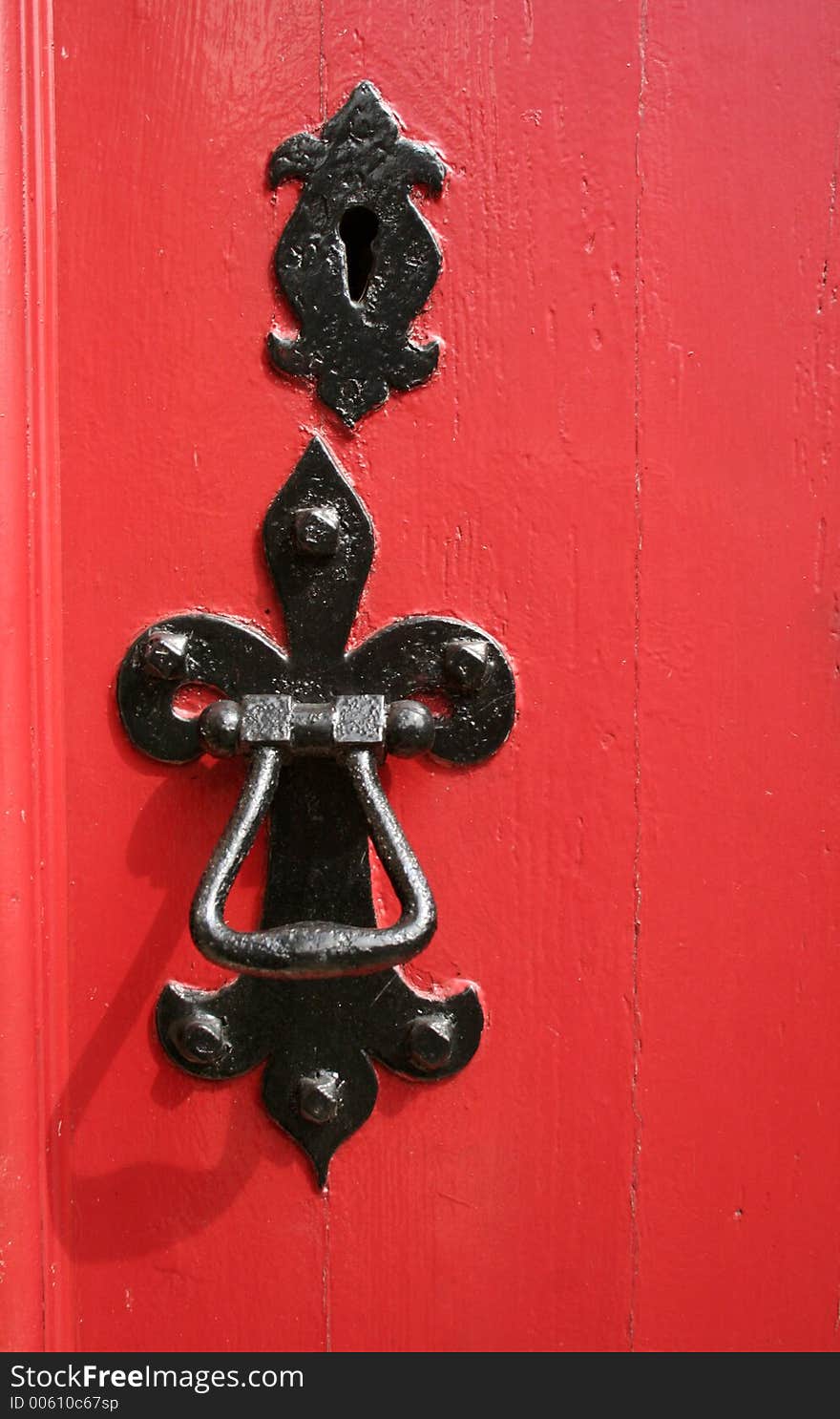 Beautiful old door handle and key hole on a church door in Northumberland, England. Beautiful old door handle and key hole on a church door in Northumberland, England