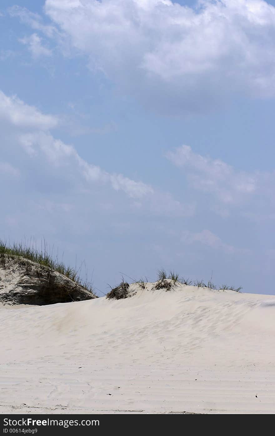 Blue sky warm sand