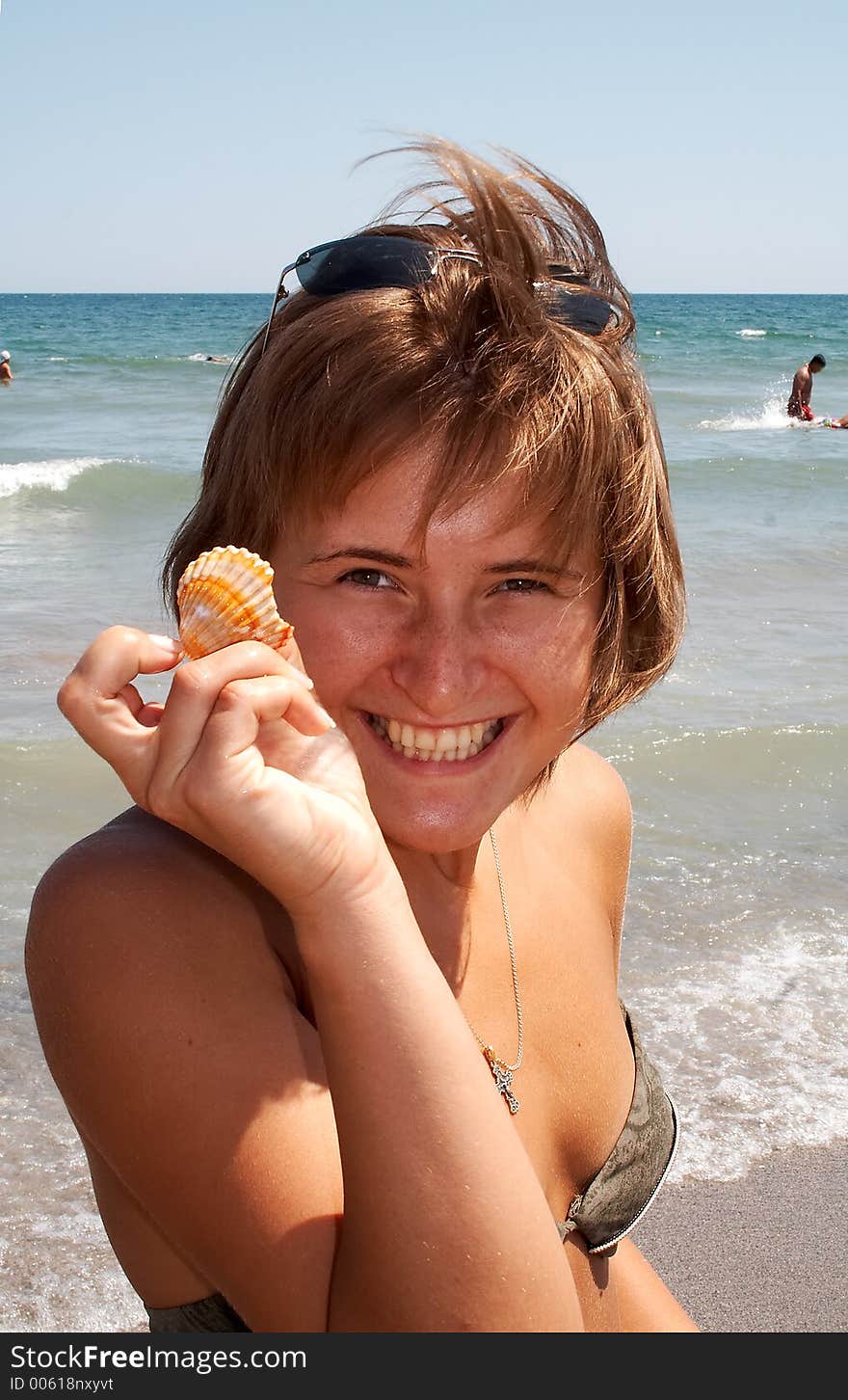 Young lady with cockle-shell