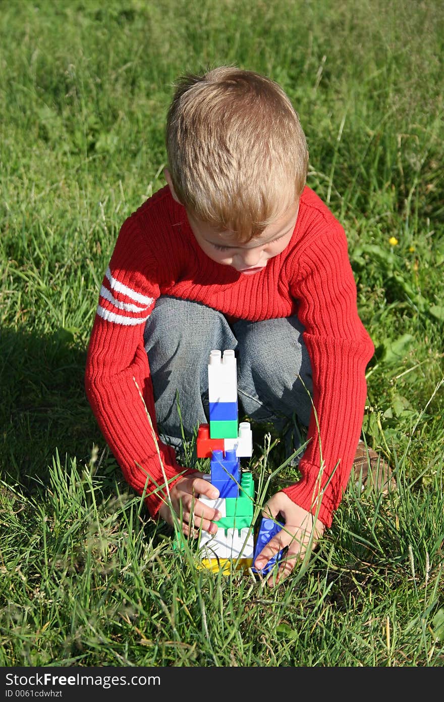 Child play in grass