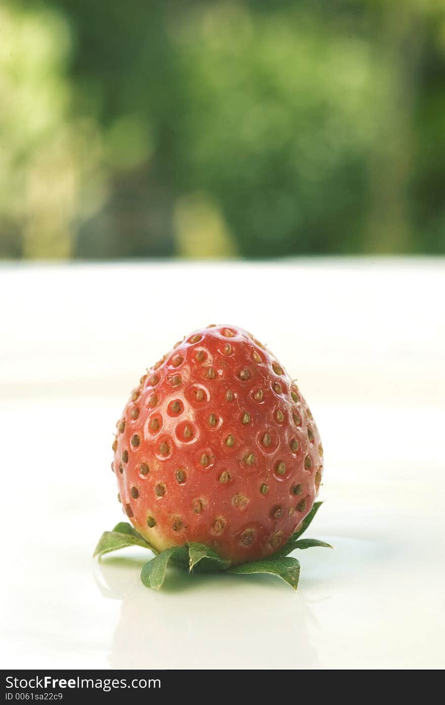 Strawberry on white plate