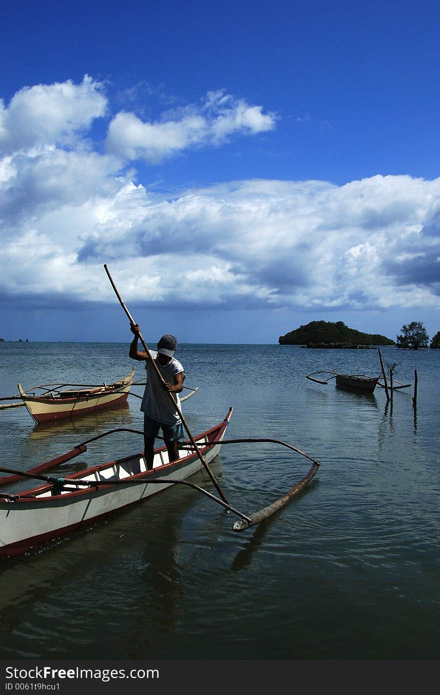 Fisherman coming home from a fishing trip. Fisherman coming home from a fishing trip