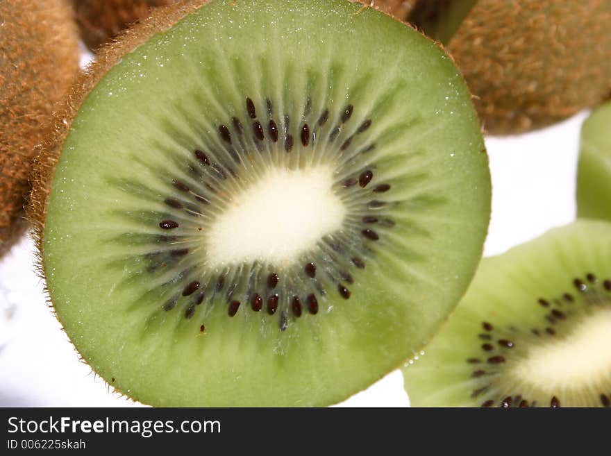 A delicious ripe kiwi fruit sliced open.