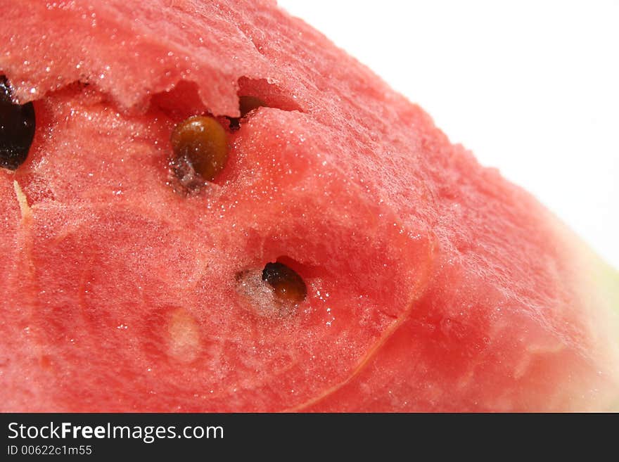 A close up of a piece of watermelon. A close up of a piece of watermelon.