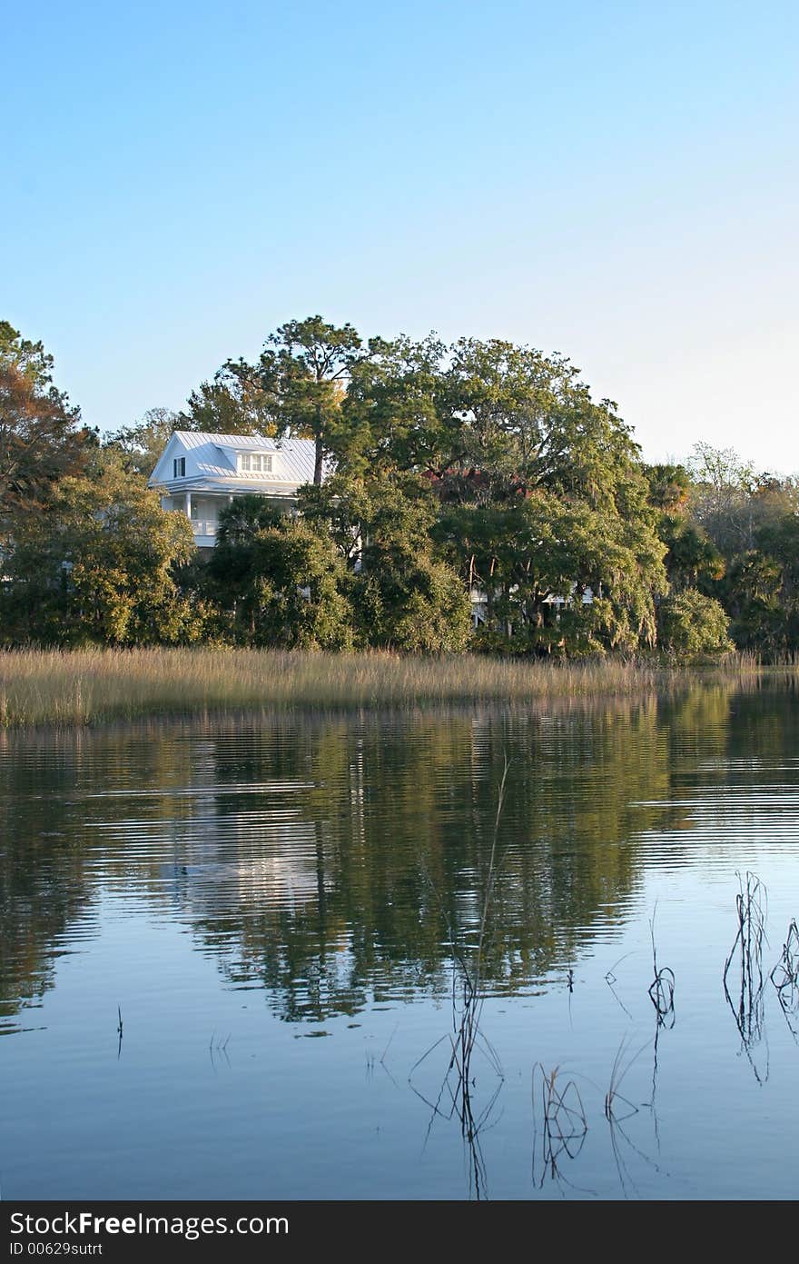 Cottage reflecting on the water. Cottage reflecting on the water