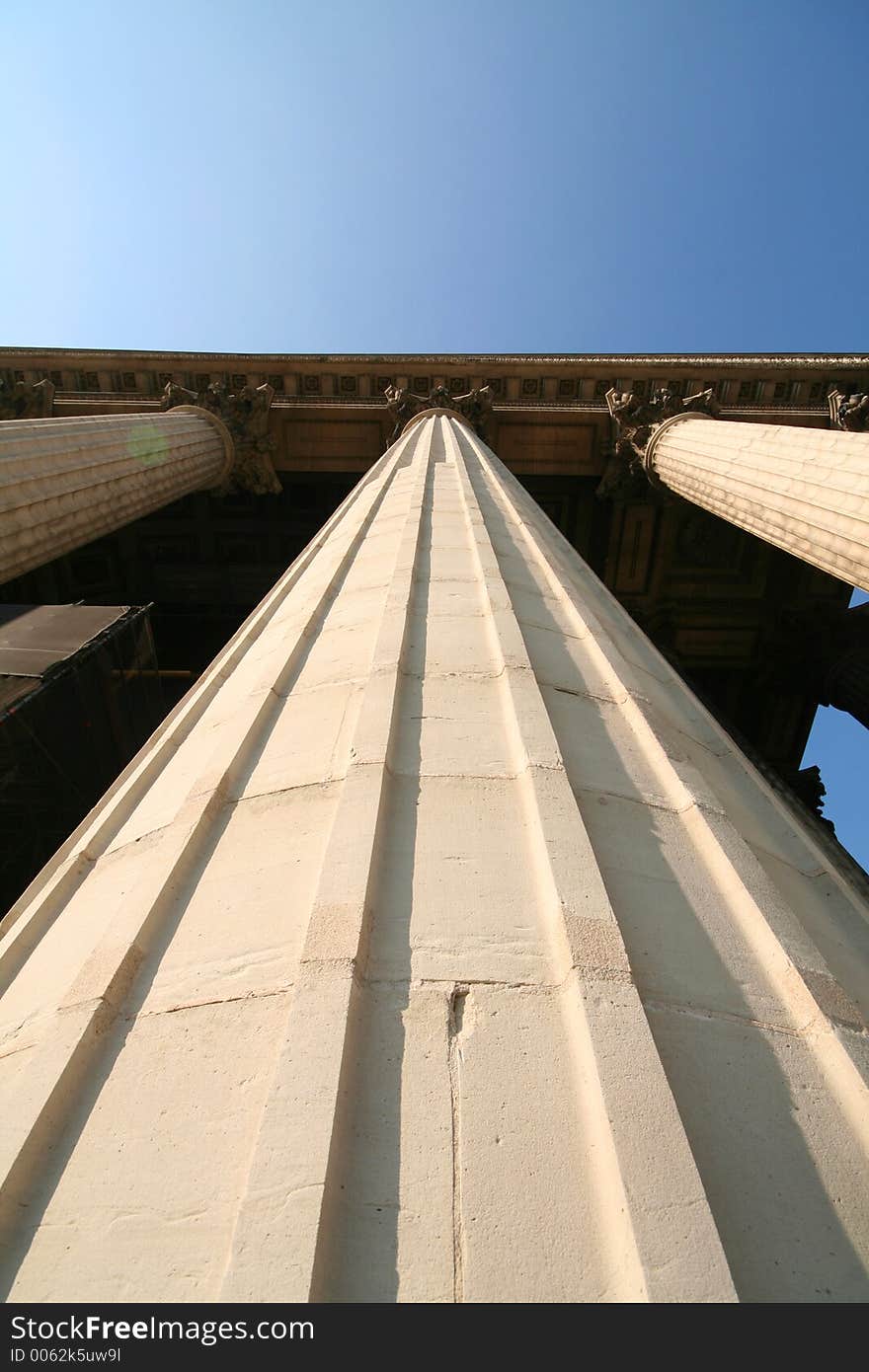 Column of a stone monument, in Paris, France. Column of a stone monument, in Paris, France