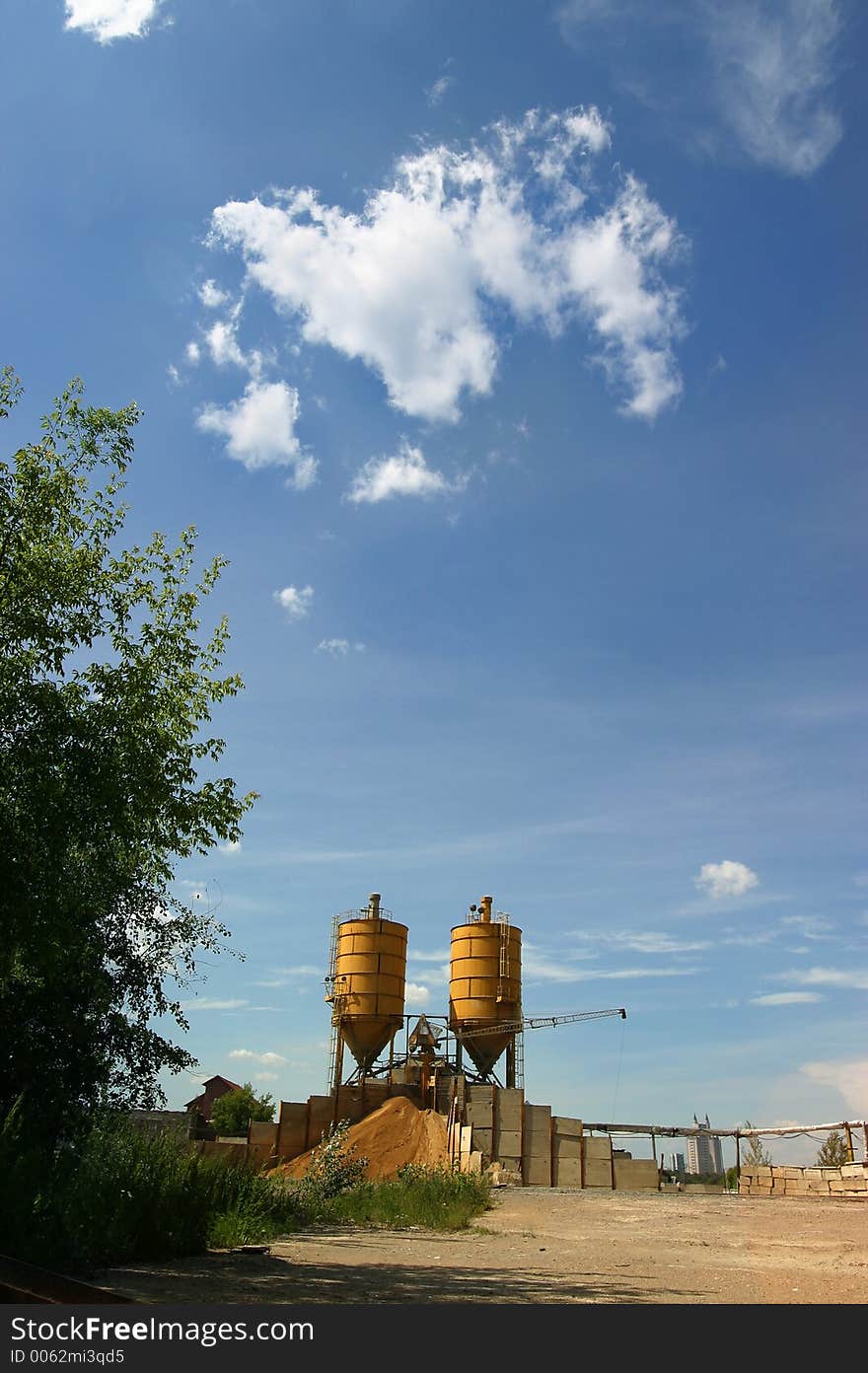 Factory details on a background of the sky