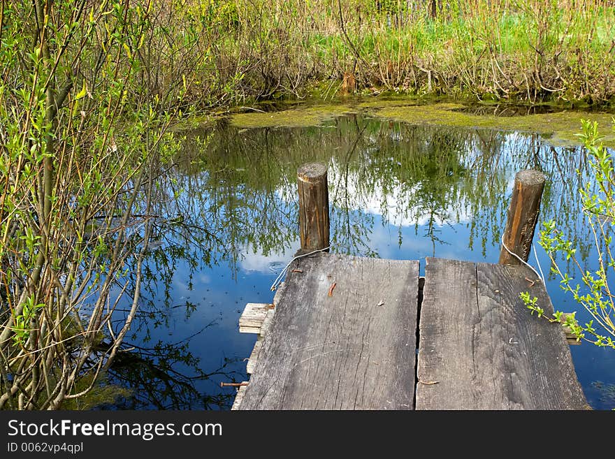 Cosy nook at a small spring pond. Cosy nook at a small spring pond