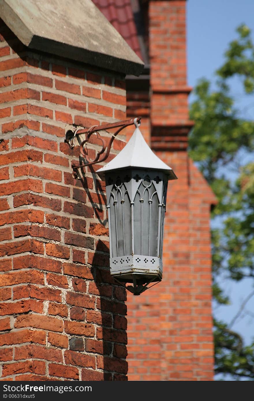 Old paraffin lamp mounted at Gietrzwald sanctuary's wall. Old paraffin lamp mounted at Gietrzwald sanctuary's wall