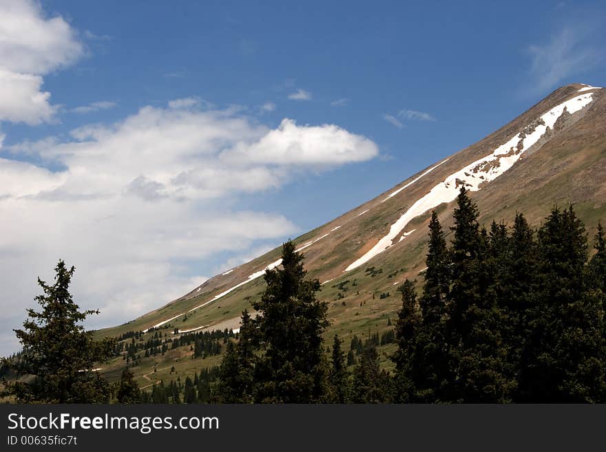 The gentle rise of a mountain from a meadow pasture denotes a peaceful, calm existence there. The gentle rise of a mountain from a meadow pasture denotes a peaceful, calm existence there.