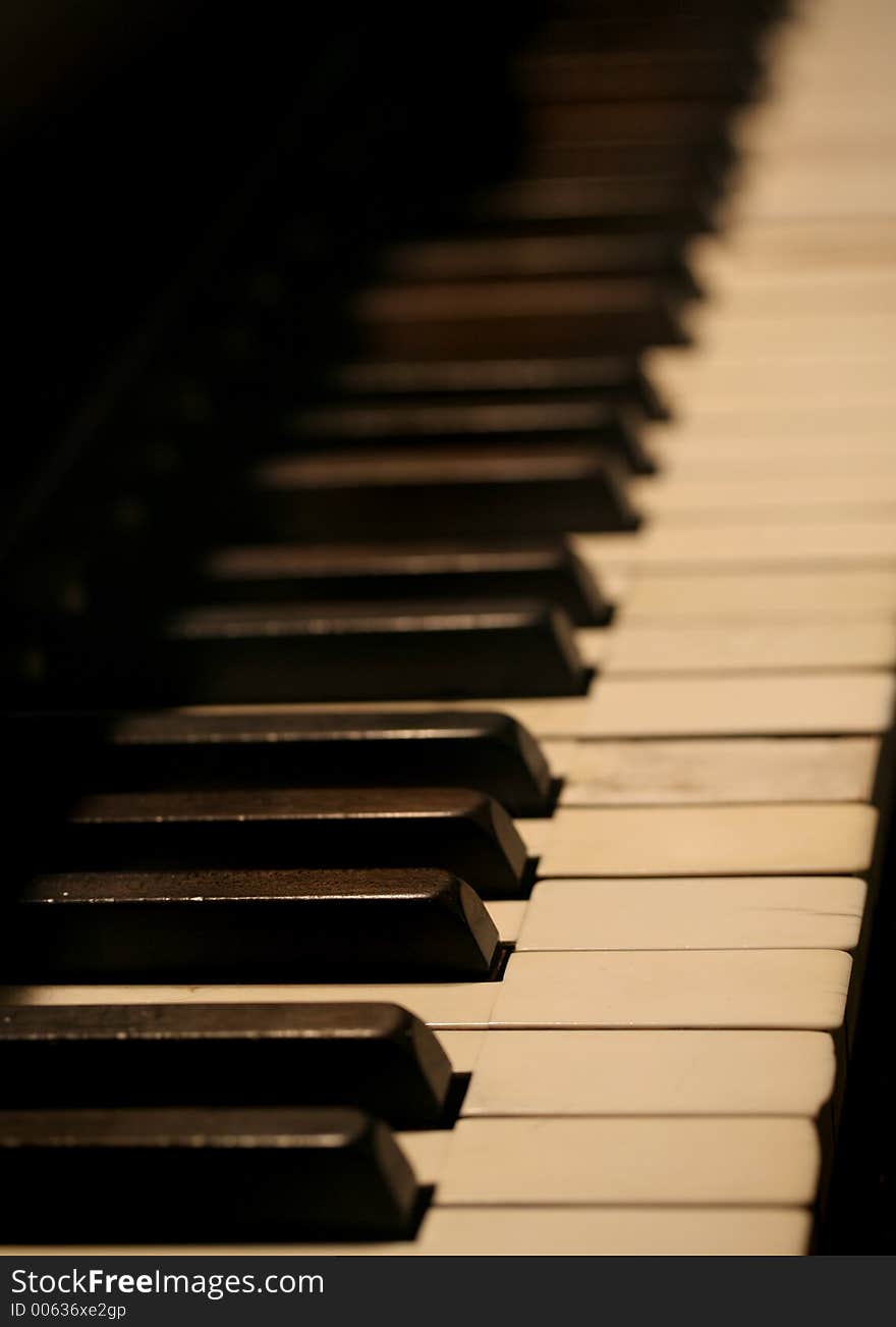 Close up of old piano keyboard