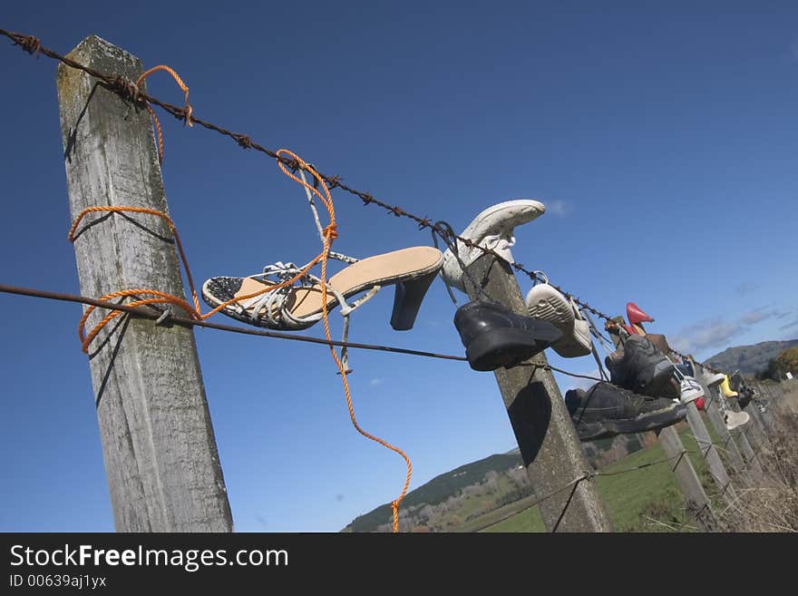 Shoes On Fence