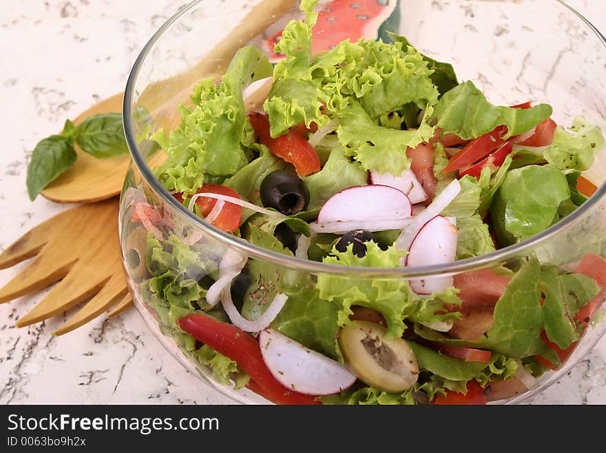 Salad bowl with fresh salad and tomato. Salad bowl with fresh salad and tomato