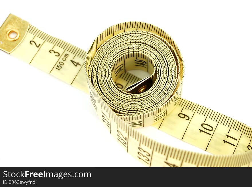 Yellow measure tape on white background. Yellow measure tape on white background